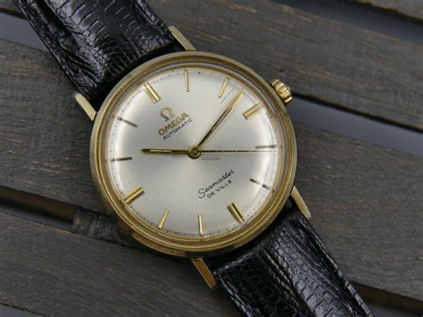 omega seamaster 14k gold automatic.